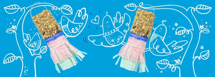 Ručno izrađene hranilice za ptice sa sjemenkama i ukrasnim papirnatim resama koje vise s ilustriranih grana s ilustriranim pticama