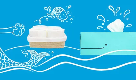 Role toaletnog papira i spremište toaletnog papira iz kućne izrade u obliku plavog kita s ilustriranom sirenom